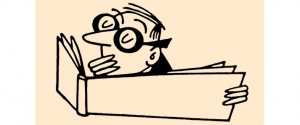 Man_examining_book,_document,_guide