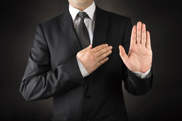 Justice Ministry oath requires lawyers to swear Communist Party allegiance