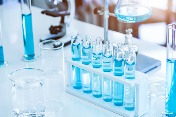 Laboratory test tubes and solution with stethoscope background. Science and Medical concept. Scientist research and analysis biotechnology concept Krishnamurthy & Co Shwetambari Rao Platinum Partners K Law
