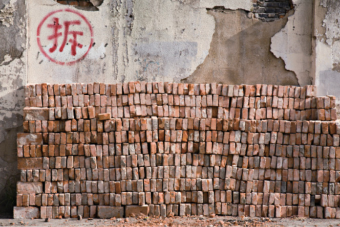 New rules seek to end forced demolitions and relocations, 新“拆迁条例”出台 “暴力拆迁”成为历史