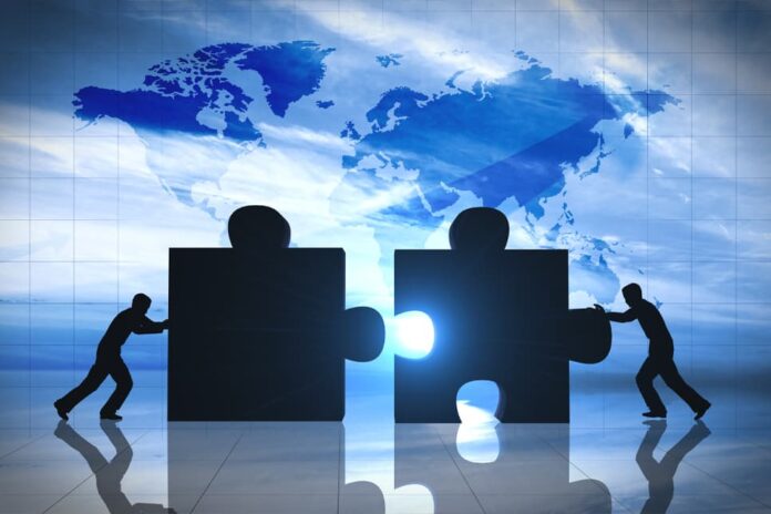 GMR powers ahead with merger