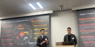 From left to right PwC leaders Eric Chin (left) and Alex Rosenrauch discuss generative AI with attendees.