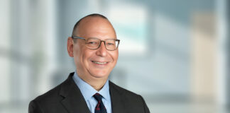 Lawrence Carter returns to DLA Piper